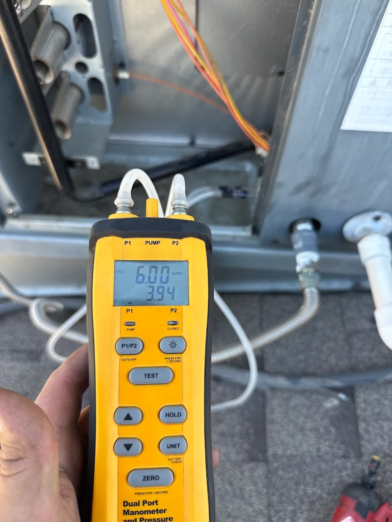 AC refrigerant pressure check during maintenance in San Bernardino, CA