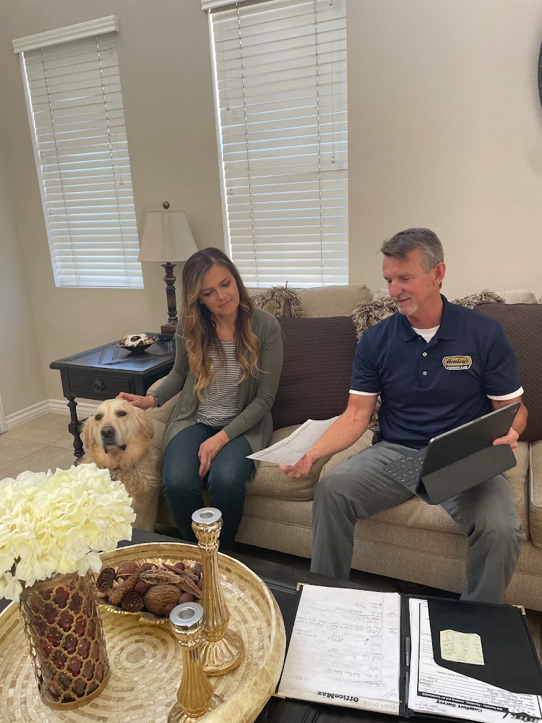 Henley's technician reviewing a home service plan with a homeowner in San Bernardino, CA